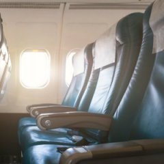 The Secret Reason Why Airplane Seats Are Almost Always Blue