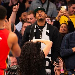 Melo Sits Courtside After Wade Gives Insight Into His Future Melo Sits Courtside After Wade Gives Insight Into His Future